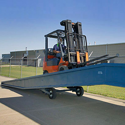 Picture showing a loading ramp being used by a forklift truck